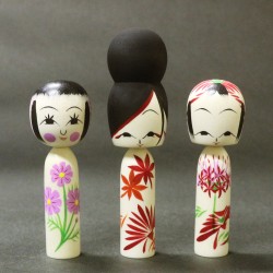 Kokeshi with autumn patterns by Wagatsuma Noboru